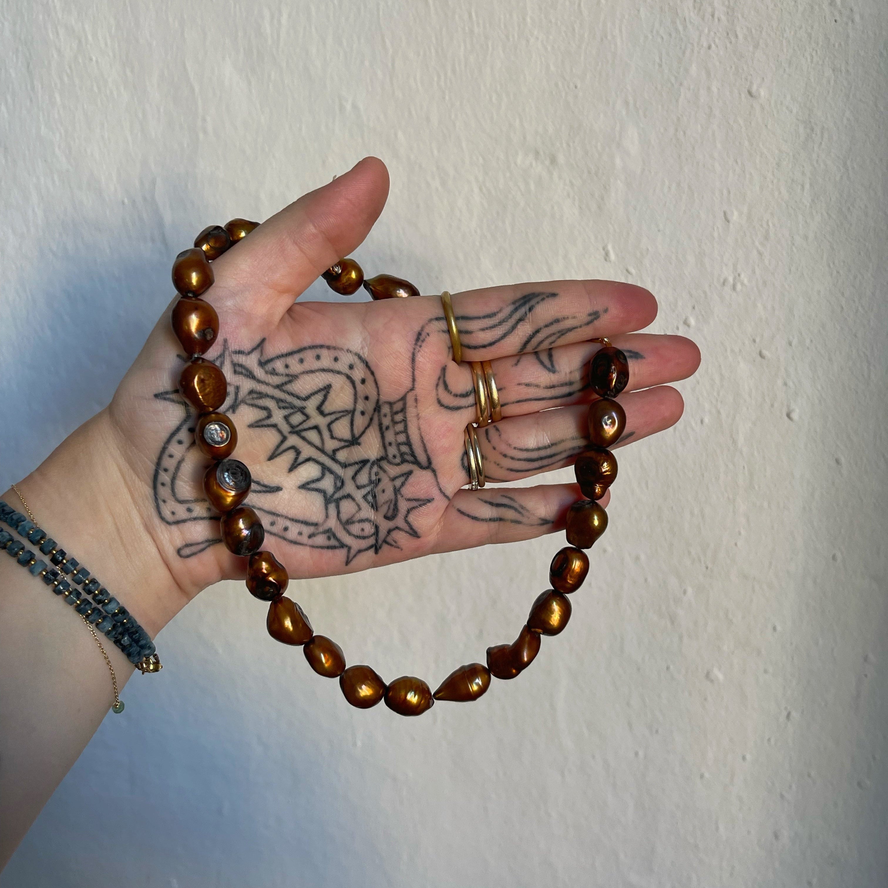 Girocollo in perle di fiume bronzo